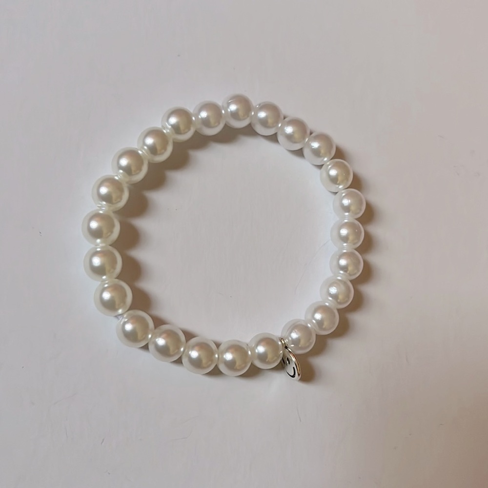 Pearl beaded bracelet with smile charm